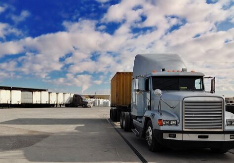 Heavy goods truck leaving loading bay